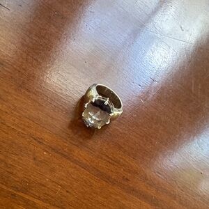 SilverStatement Ring with Clear Gemstone along with Amethyst bands.